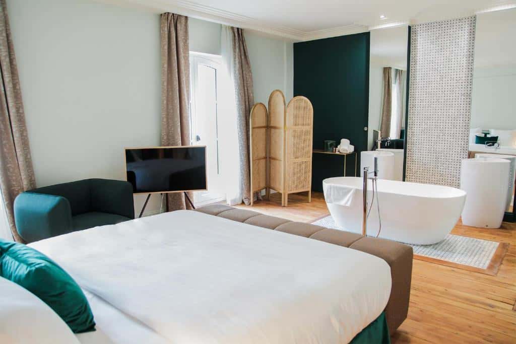 Chambre hôtel décoration verte aménagement suite
