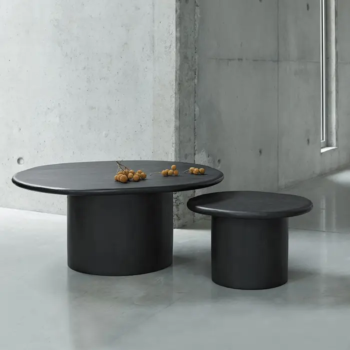 Table basse ronde noire brut minimaliste design